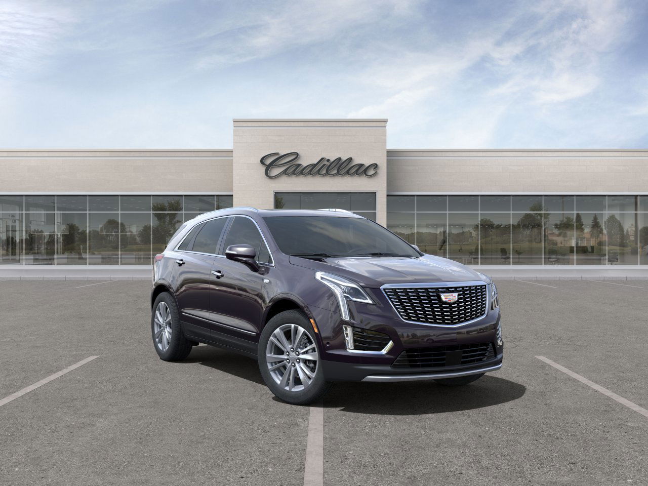 2025 Gray Cadillac XT5 in front of Cadillac dealership